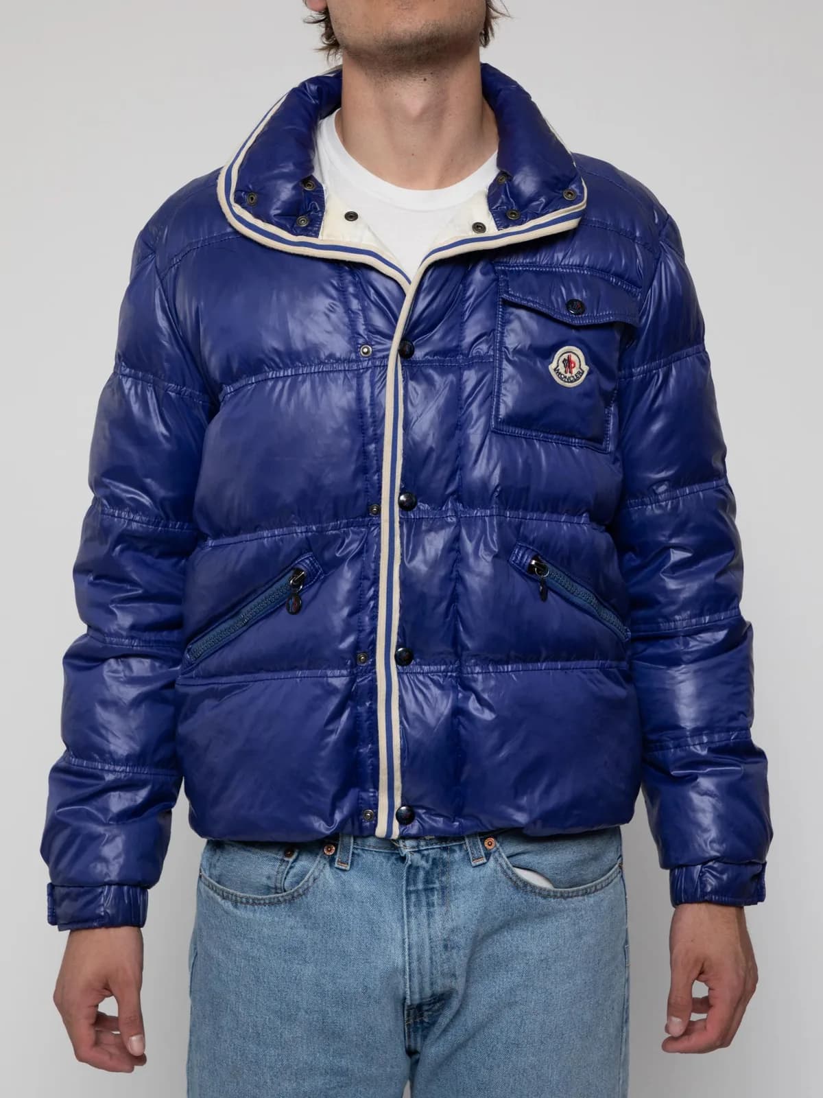 Early 90's puffer coat with interior elasticated waist, button closure, chest pocket and slant zip pockets - Image 1