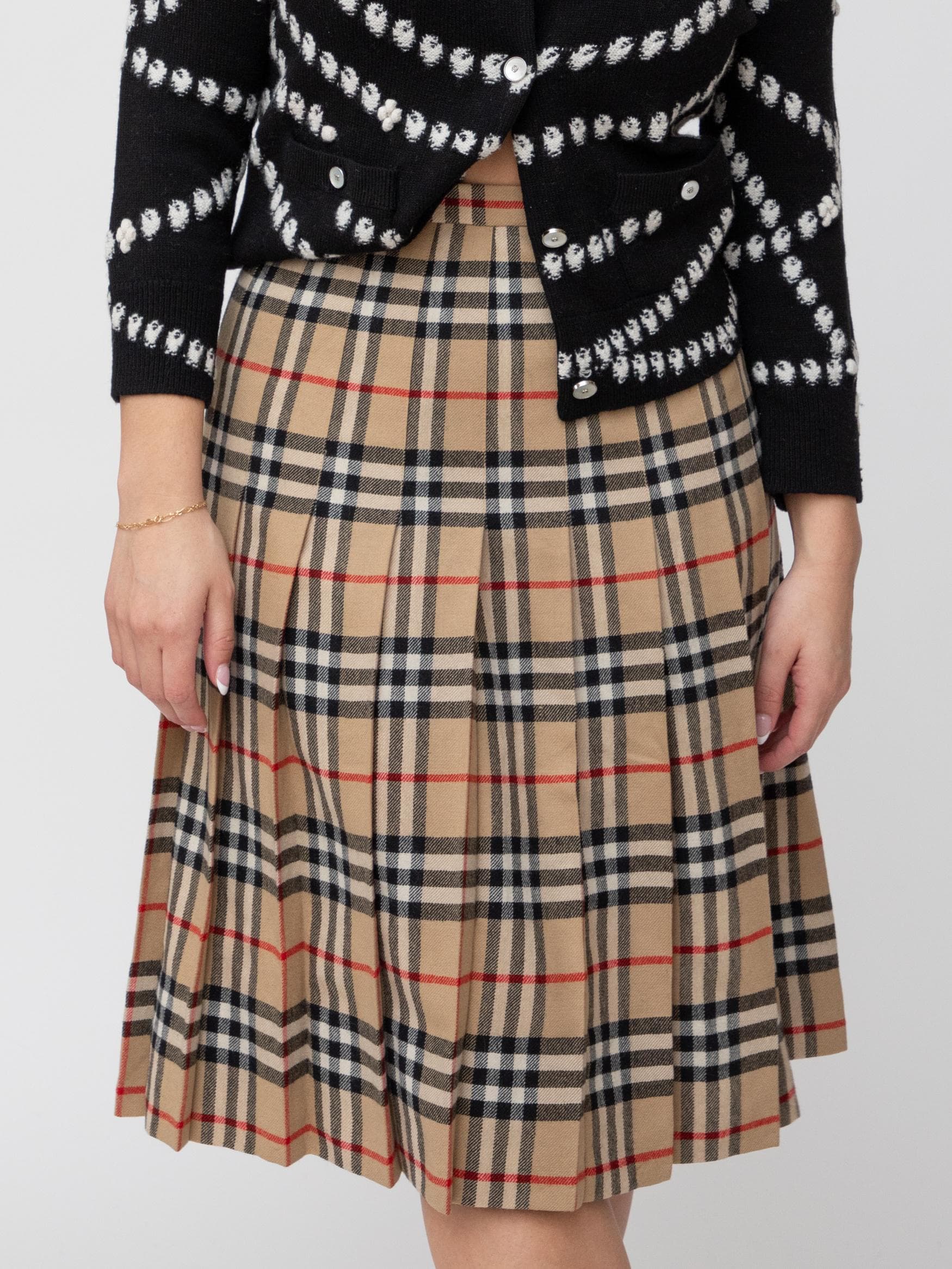 Early 90's knee length pleated skirt in burberry tartan - Image 1