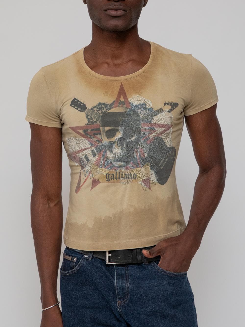 Mid 00s round neck faded brown graphic tee with skull rockstar graphic in print and lace applique, patch star on the back - Image 1