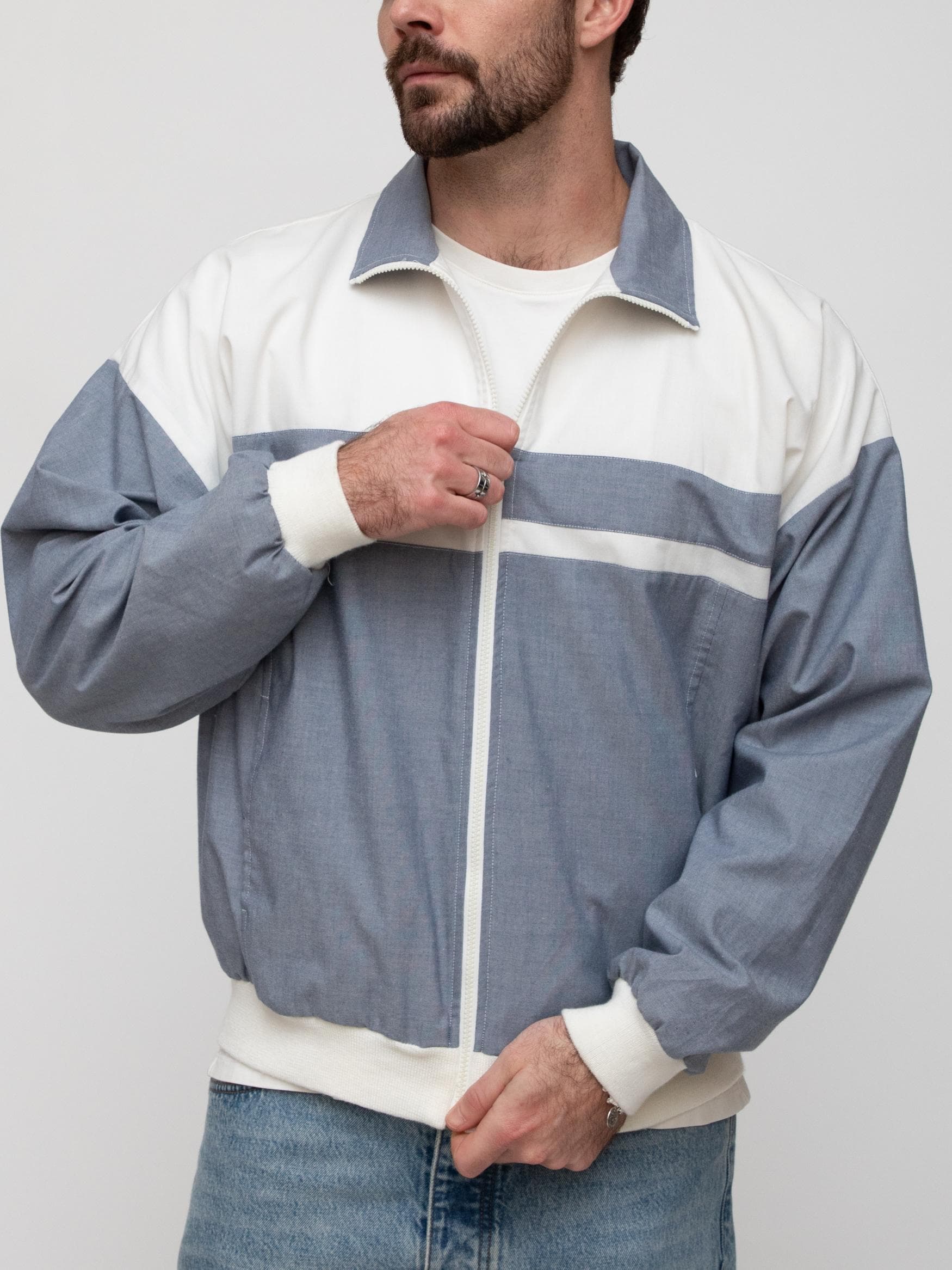 Early 90's chambray cotton tennis jacket with white and denim blue colourblock pattern and full neck zip - Image 1