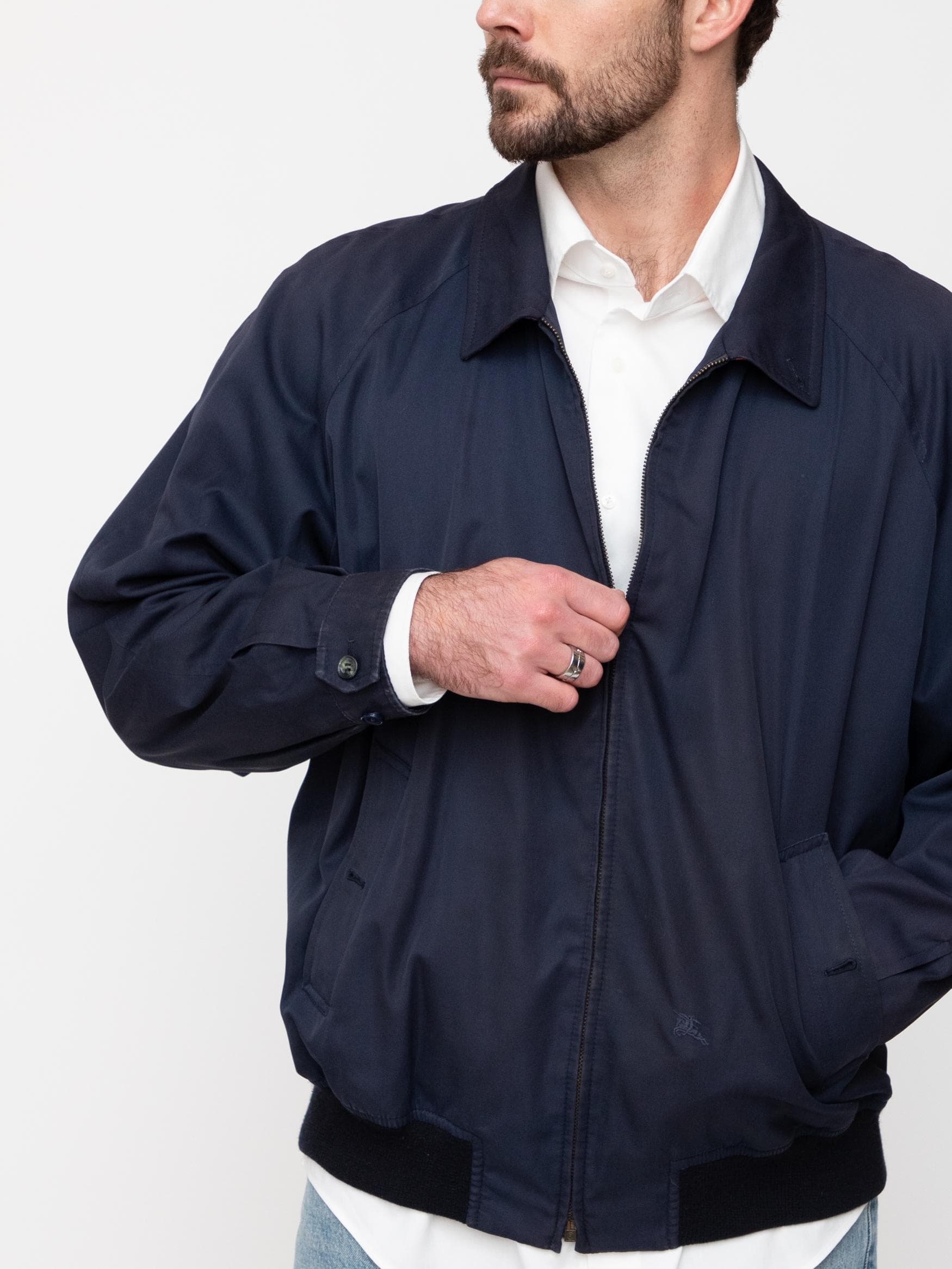 Late 80's Burberry harrington jacket in navy cotton with navy tartan lining and the Burberry Prosum knight logo signifying the highest level of couture at the time - made in Spain - Image 1