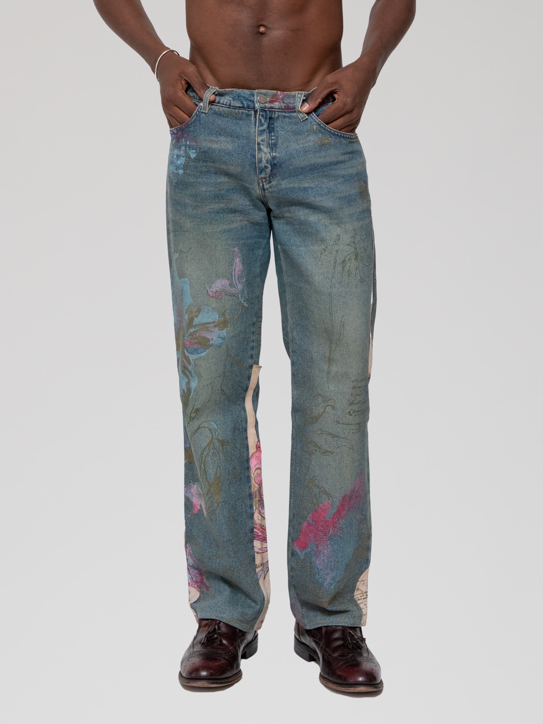 Early 00s straight leg light wash denim with painted floral motifs and leather patches - Image 1
