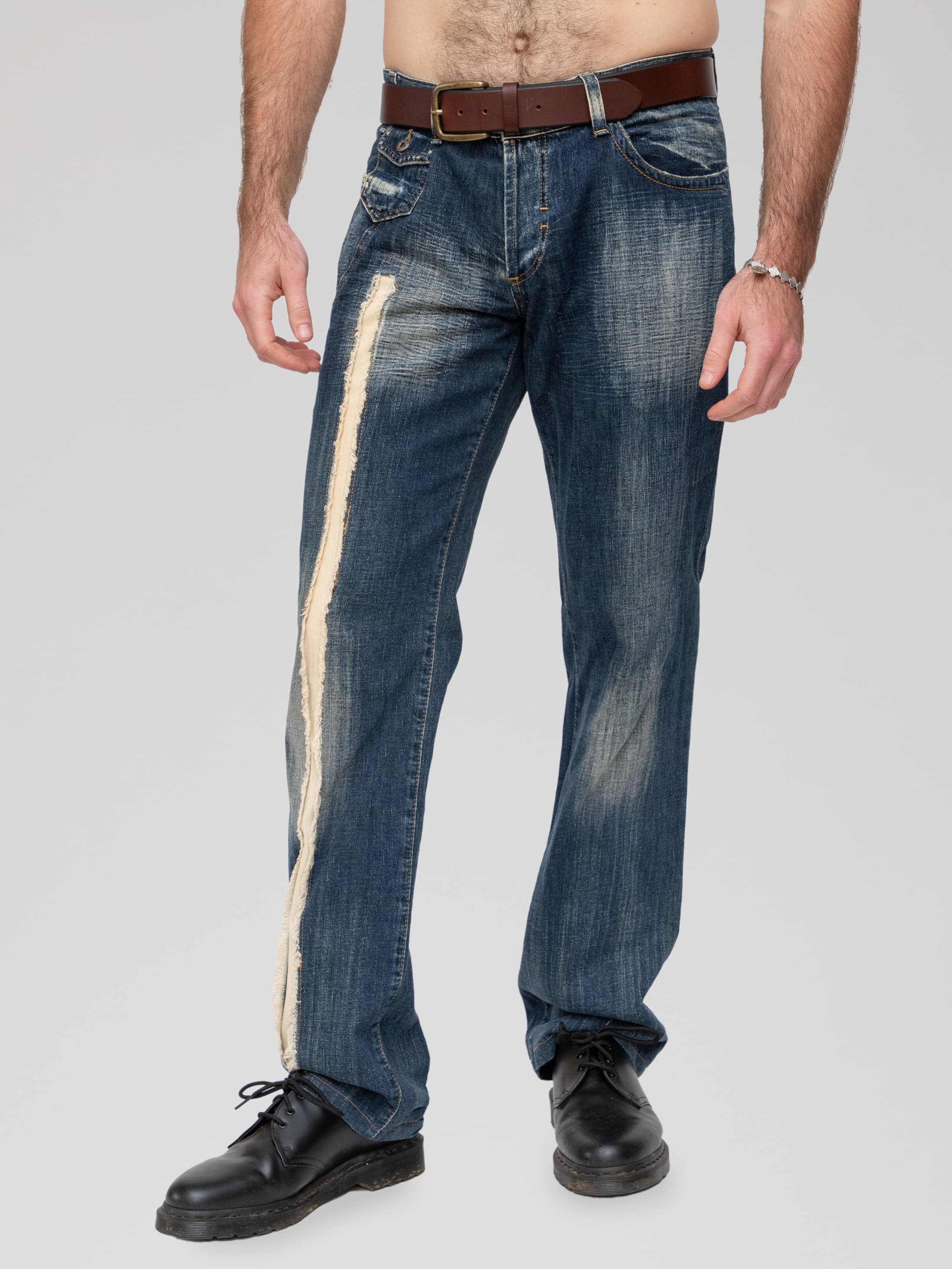 Autumn/Winter 2005 denim trousers with rip frayed detailing down the right leg and intentional distressing throughout - dark rinse - Image 1