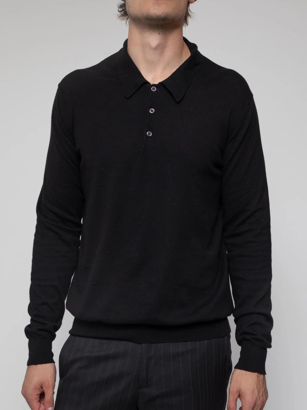 Late 00's black polo collar long sleeve sweater with three button placard and ribbed cuffs and hem - Image 1