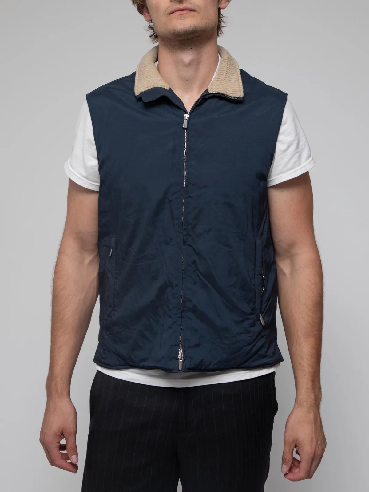 Mid 90's navy gilet with cashmere lining and ribbed collar, full zip and zip pockets - made with their exclusive Twenty K StormSystem fabric, offering wind and rain protection - Image 1