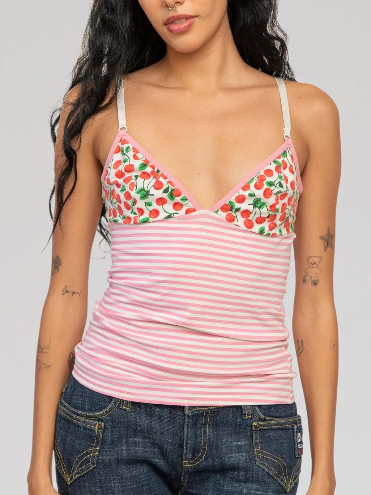 D&G Dolce & Gabbana fitted camisole top featuring a cherry-printed V-neck bralette bust with pink piping trim, a body crafted in a pink and white horizontal stripe jersey knit, adjustable slim white shoulder straps, and a branded logo trim along the upper back reading "i ♥ D&G". - Image 1