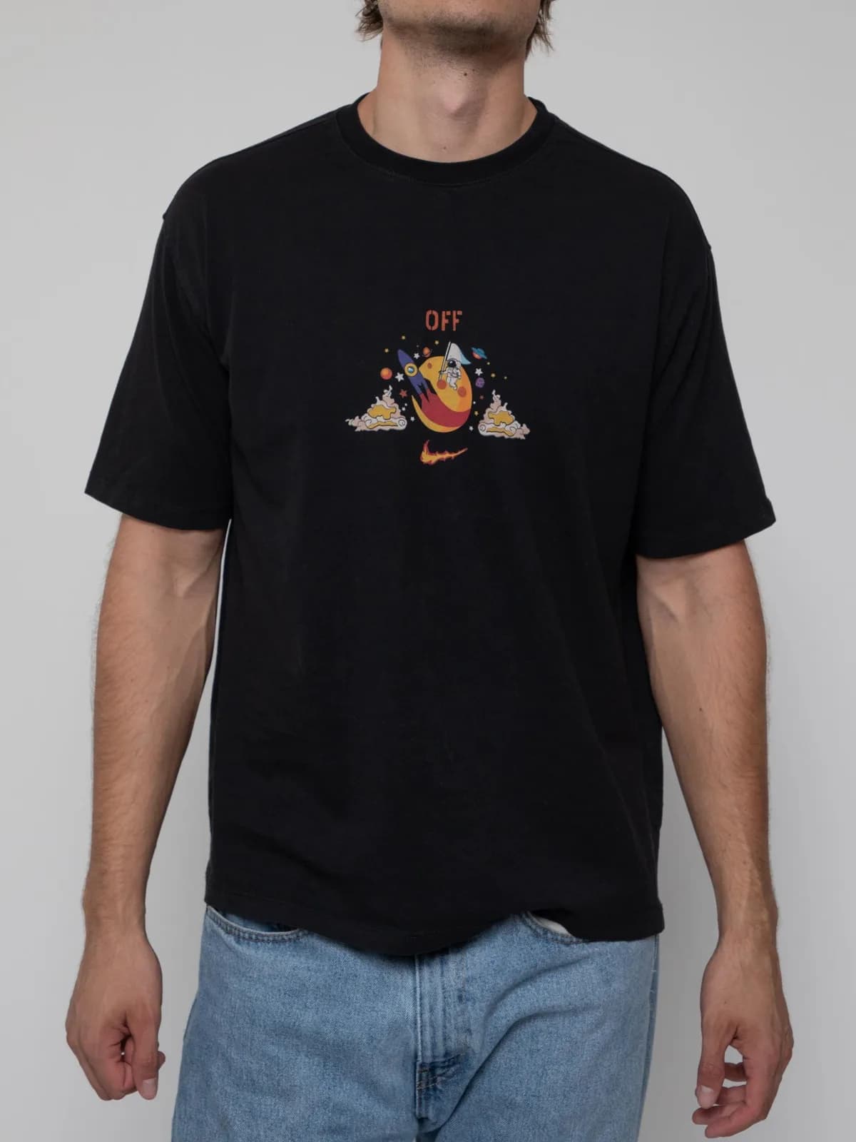 Late 00's black crew neck short sleeve t-shirt from the "SEASONAL" collection with off white spaceman graphics on the front and across the back - Image 1