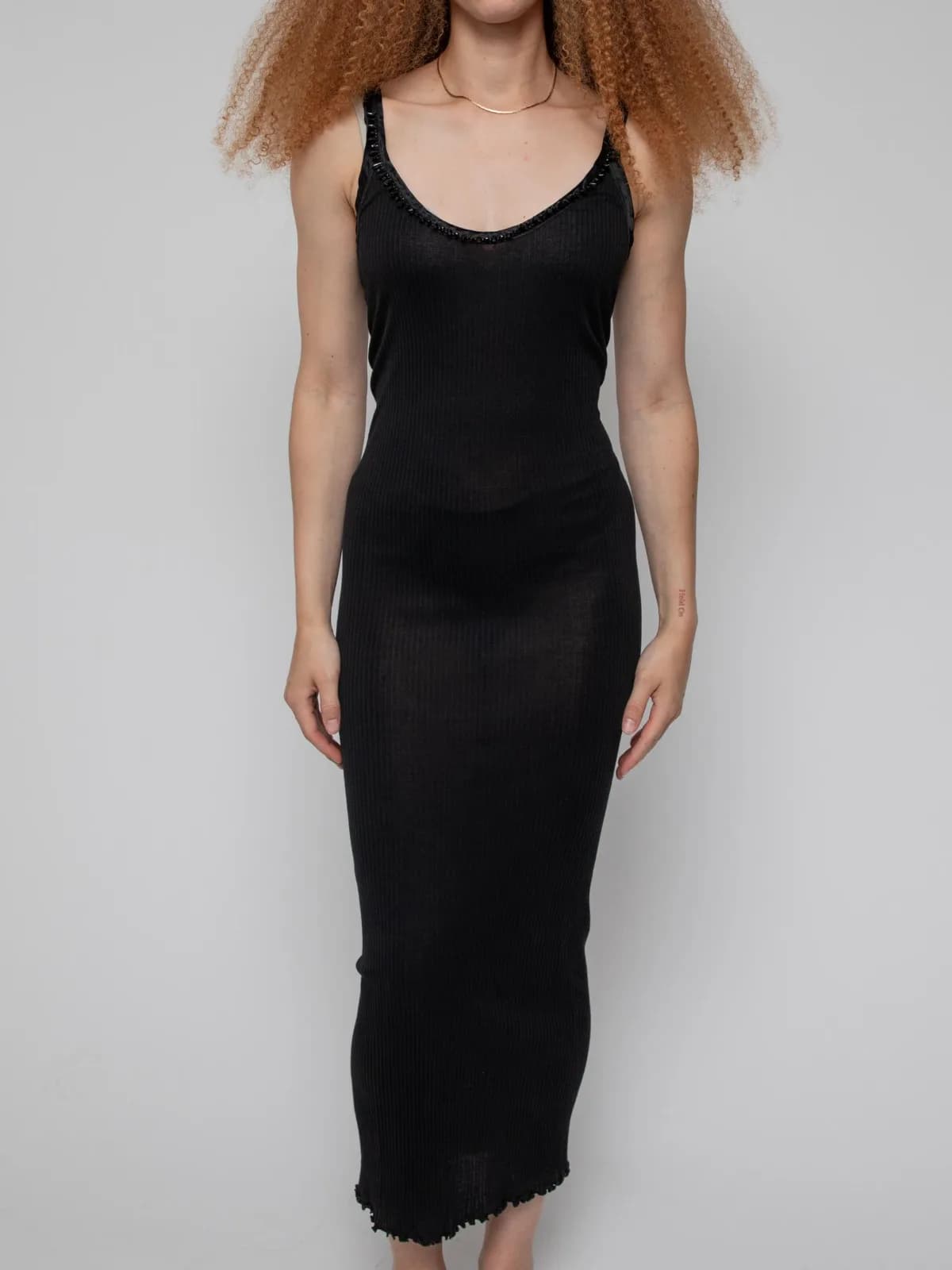 Early 00 black maxi bodycon dress from the lingerie line features a crystal lined low cut neckline - Image 1