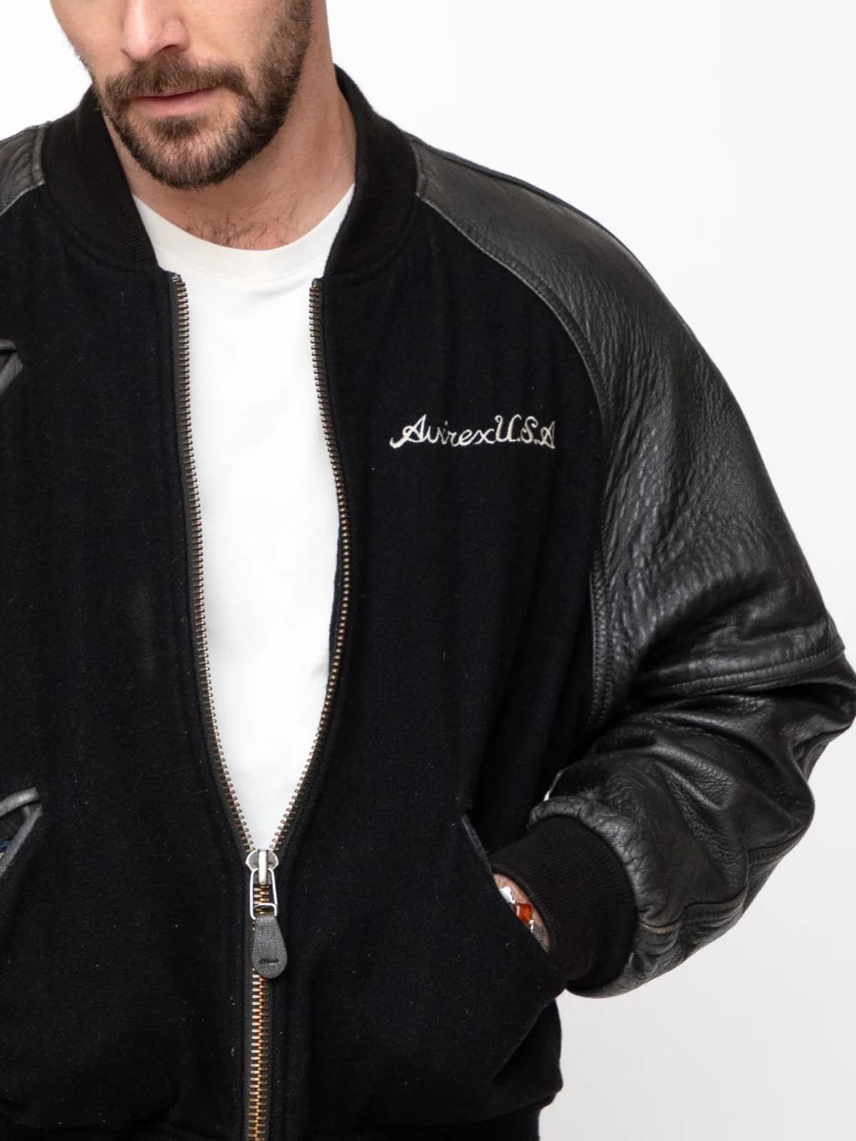 Early 90s wool and leather bomber jacket with Avirex brand name stitching on front chest, Memphis Belle stich artwork on the back and Avirex varsty patch on the inside. - Image 1